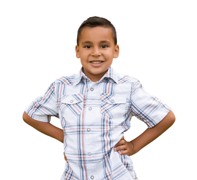 Niño sonriente con actitud segura representa confianza adquirida a través del entrenamiento de BJJ.